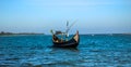 Floating boat in deep blue sea in coast of Saint Martin Island of Bangladesh Royalty Free Stock Photo