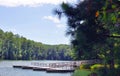 Floating boat slips and dock on a picturesque lake Royalty Free Stock Photo