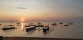 Floating boats ocean beach sunset sunrise Royalty Free Stock Photo