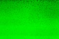 Floating bubbles in green liquid background texture. Royalty Free Stock Photo