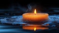 Floating candle surrounded by water droplets at night, tranquility and meditation concept Royalty Free Stock Photo