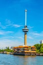 Floating chinese restaurant in front of Euromast tower in Rotterdam, Netherlands