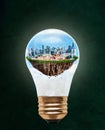 Floating City of Singapore Inside Light Bulb With Copy Space