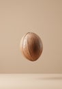 Floating coconut on beige background. Royalty Free Stock Photo