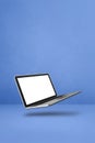 Floating computer laptop isolated on blue. Vertical background Royalty Free Stock Photo