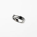 Floating counter-sunk riser ring, metallic, floating in mid air horizontally, on solid white background Royalty Free Stock Photo