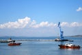 Floating crane and marine tug Royalty Free Stock Photo