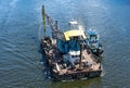 Floating crane and river tug Royalty Free Stock Photo