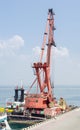 Floating crane at the seaport berth