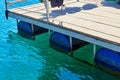 Floating Dock made with empty Plastic Barrels Royalty Free Stock Photo