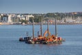 Floating dredging platform on the sea