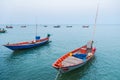 Floating fishing boats aground at the harbor over cloudy sky at Chanthaburi, Thailand Royalty Free Stock Photo