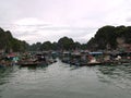 Floating fishing village in Ha Long Bay. Vietnam Royalty Free Stock Photo