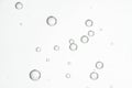 Floating fizz bubbles over gradient background Royalty Free Stock Photo