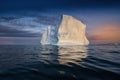 floating glacier with a human face made of shadows