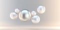Floating glossy white spheres in a minimalistic abstract 3d composition