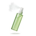 Floating green tea facial mist spray bottle on a solid white background Royalty Free Stock Photo