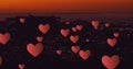 Floating hearts over a nighttime cityscape