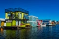 Floating Home Village colorful Houseboats Water Taxi Fisherman`s Wharf Reflection Inner Harbor, Victoria British Columbia Canada