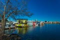 Floating Home Village colorful Houseboats Water Taxi Fisherman`s Wharf Reflection Inner Harbor, Victoria British Columbia Canada Royalty Free Stock Photo