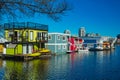 Floating Home Village colorful Houseboats Water Taxi Fisherman`s Wharf Reflection Inner Harbor, Victoria British Columbia Canada Royalty Free Stock Photo