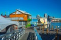 Floating Home Village colorful Houseboats Water Taxi Fisherman`s Wharf Reflection Inner Harbor, Victoria British Columbia Canada Royalty Free Stock Photo