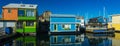 Floating Home Village Houseboats Fisherman`s Wharf Inner Harbor, Victoria British Columbia Canada.Area has floating homes, boats, Royalty Free Stock Photo