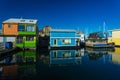 Floating Home Village Houseboats Fisherman`s Wharf Inner Harbor, Victoria British Columbia Canada.Area has floating homes, boats, Royalty Free Stock Photo