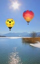 Floating hot air balloons over lake tegernsee, germany Royalty Free Stock Photo