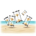 Floating Hourglasses on Sandy Beach Background Time Passing Metaphor Royalty Free Stock Photo