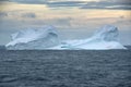 Floating Iceberg With A Colony Of Gentoo Penguins At Sunset In Bransfield Strait Near The Northern Tip Of The Antarctic Peninsula Royalty Free Stock Photo