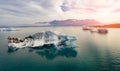 Floating icebergs in Jokulsarlon Glacier Lagoon in the morning mist. Colorful summer sunrise on Vatnajokull National Park, Iceland Royalty Free Stock Photo