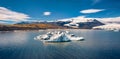Floating icebergs in Jokulsarlon Glacier Lagoon in the morning mist, view from flying drone. Royalty Free Stock Photo