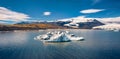 Floating icebergs in Jokulsarlon Glacier Lagoon in the morning mist, view from flying drone Royalty Free Stock Photo