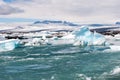 Floating icebergs and view to the glacier, ice lagoon Jokulsarlon, Iceland Royalty Free Stock Photo