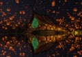 Floating lamp in yee peng festival at pagoda tree glow temple Wat Sirindhorn Wararam, Sirindhorn District, Ubon Ratchathani Royalty Free Stock Photo