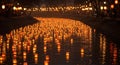 Floating lanterns light up the river at night Royalty Free Stock Photo