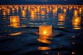 floating lanterns on water creating rippling light patterns Royalty Free Stock Photo