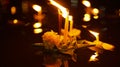 Floating loy krathong and candle in Thailand full moon folk festival