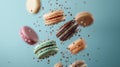 Floating Macarons with Chocolate Sprinkles on Blue Background Royalty Free Stock Photo
