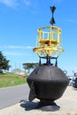 Floating maritime beacon on the dock