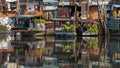 Floating market with reflection in water. Royalty Free Stock Photo