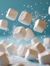 Floating marshmallows against a blue background Royalty Free Stock Photo