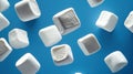 Floating Marshmallows on Blue Background Royalty Free Stock Photo