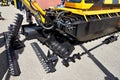 Floating mini excavator with attachments