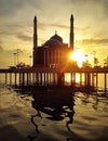 Floating Mosque with sunset background