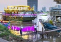 Floating nightclubs and pleasure boats,moored alongside Phnom Penh\'s riverbank