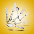 Floating Old Silverware Set with shadows on orange gradient Royalty Free Stock Photo