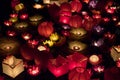 Floating paper lanterns on the water at night