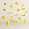 Floating pieces of cheese on white background